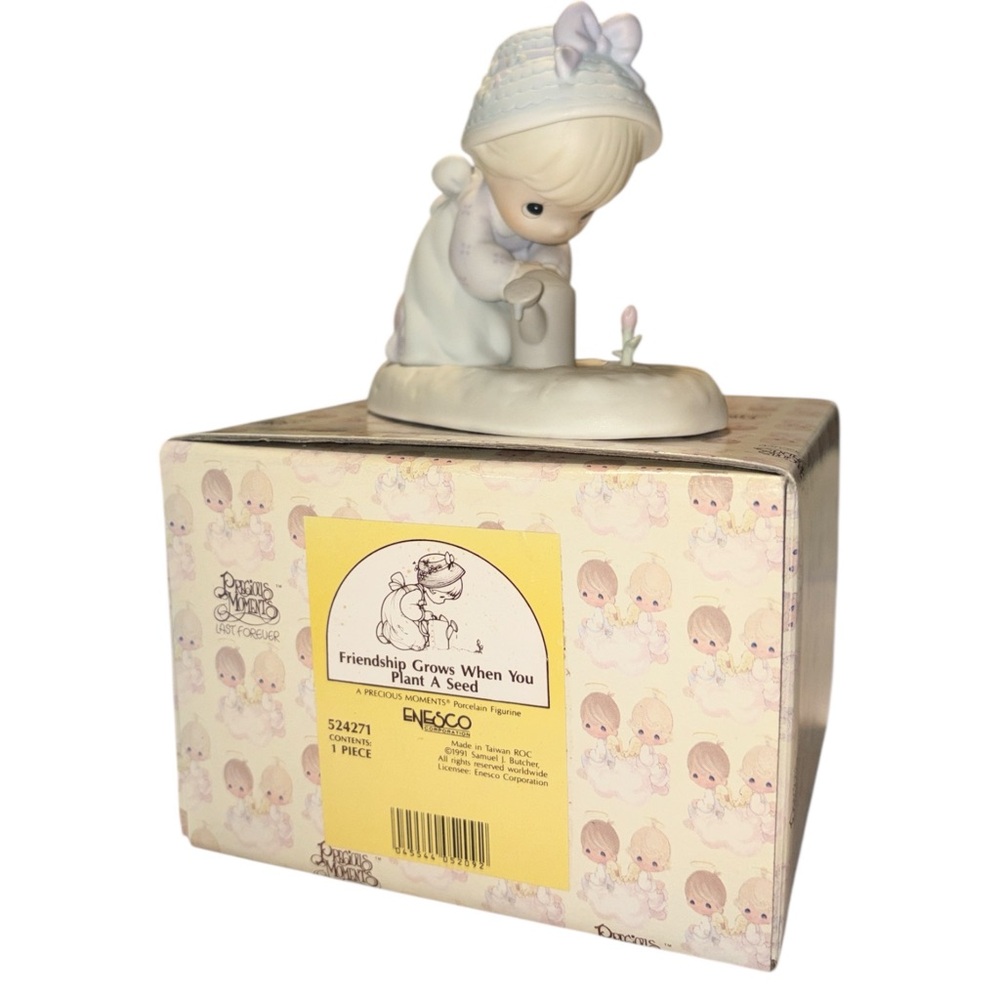 Precious Moments Blue and White Figurine